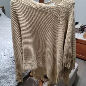 Elegant Cream Knit Sweater with Fringe